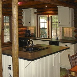 1930s Chestnut Log Cabin Kitchen